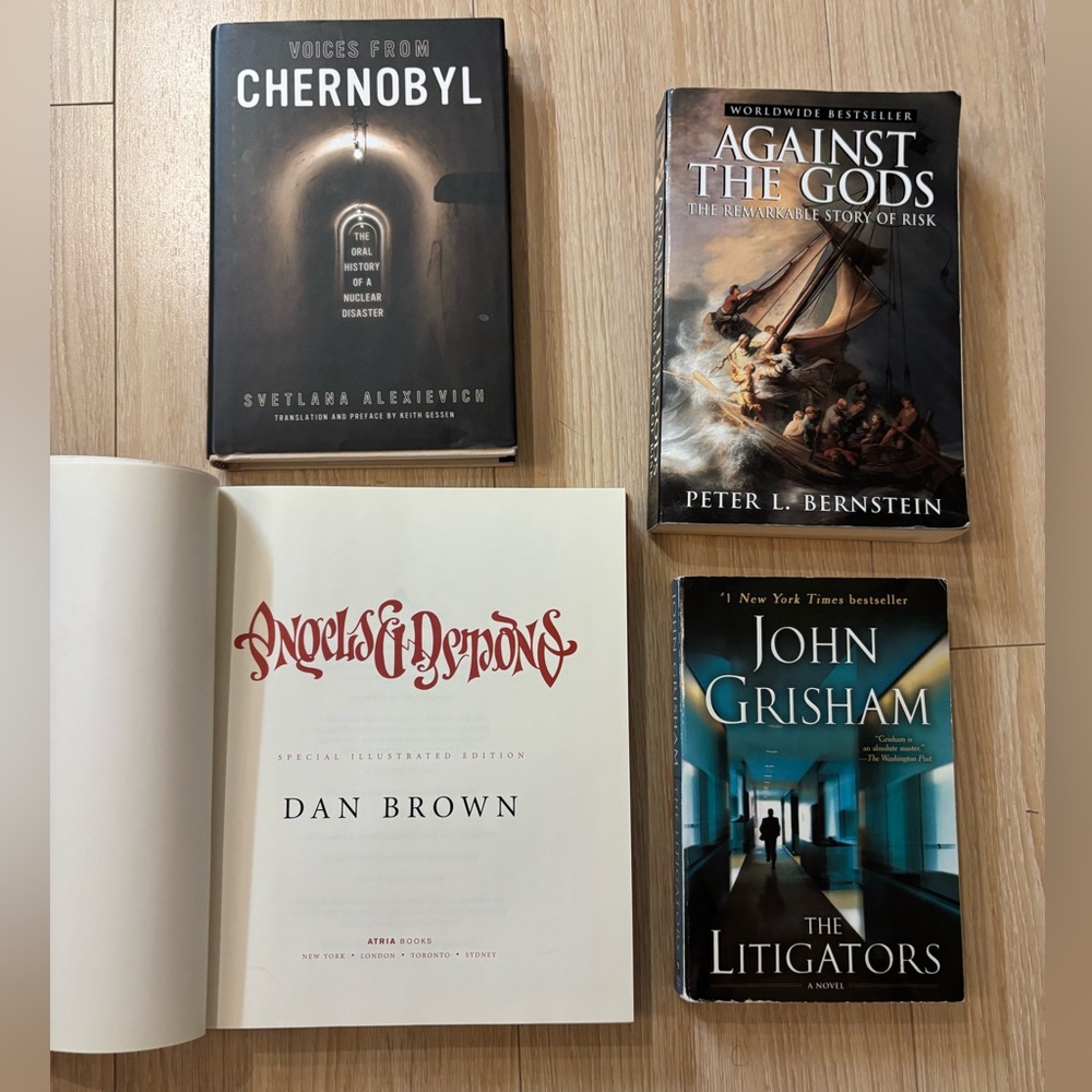 Four Pc Set of Action/Thriller/Non Fiction Books - Two Hardcover, Two Softcover.